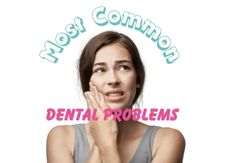 Woman holding her jaw in pain, indicating dental problems.